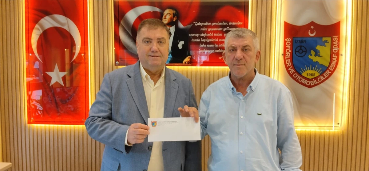 M&uuml;şterisinin parasını iade eden taksiciye Başkan Erkan &Ouml;zkan&rsquo;dan &ouml;d&uuml;l